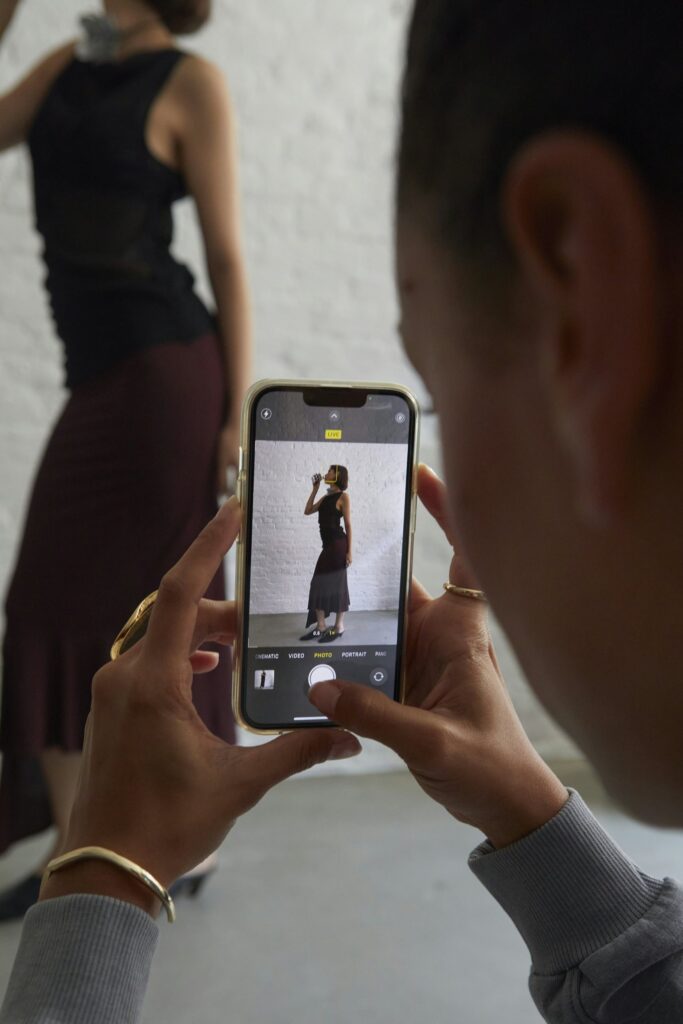 Phone capturing a photo of a guest